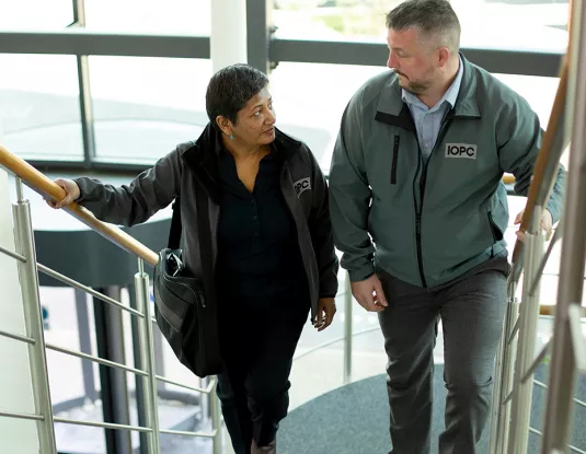 IOPC colleagues on a staircase