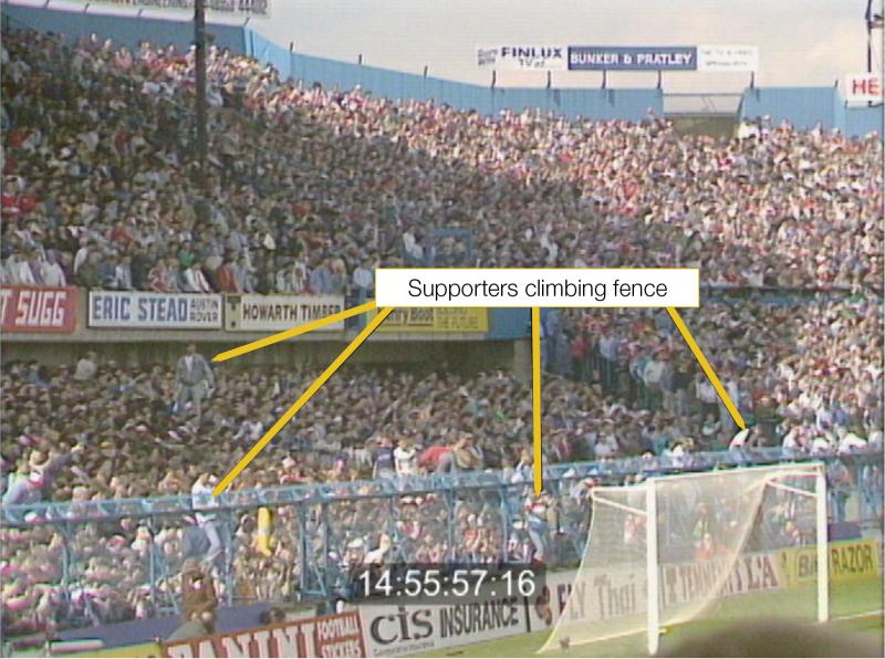 View of the front of the West Terrace at Hillsborough Stadium at 14:55:57