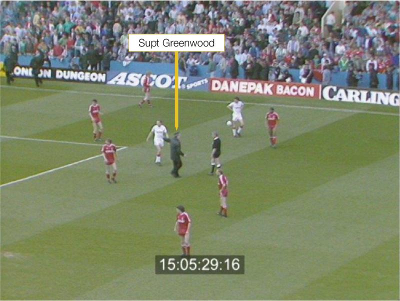 Supt Greenwood approaching the referee on the pitch at Hillsborough Stadium at 15:05:29