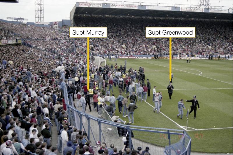 The scene in front of the West Terrace at Hillsborough Stadium at 15:07:04